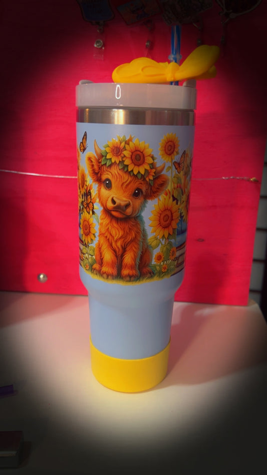 40oz Blue Stainless Steel, Highland Cow w Sunflowers tumbler. over sized yellow butterfly straw topper