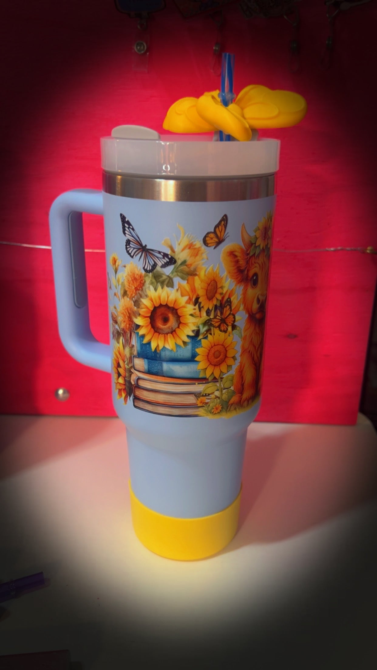 40oz Blue Stainless Steel, Highland Cow w Sunflowers tumbler. over sized yellow butterfly straw topper