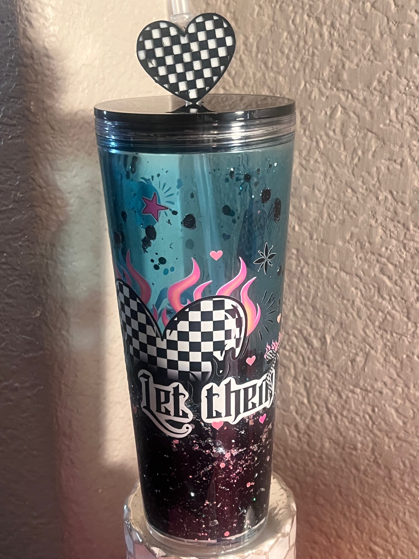 24oz Let Them Lava Snow Globe acrylic with silver glitter, blk lid w checkered, heart, straw topper